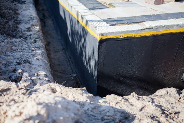 Professional Wet Basement Repair technician working in Owensville, IN